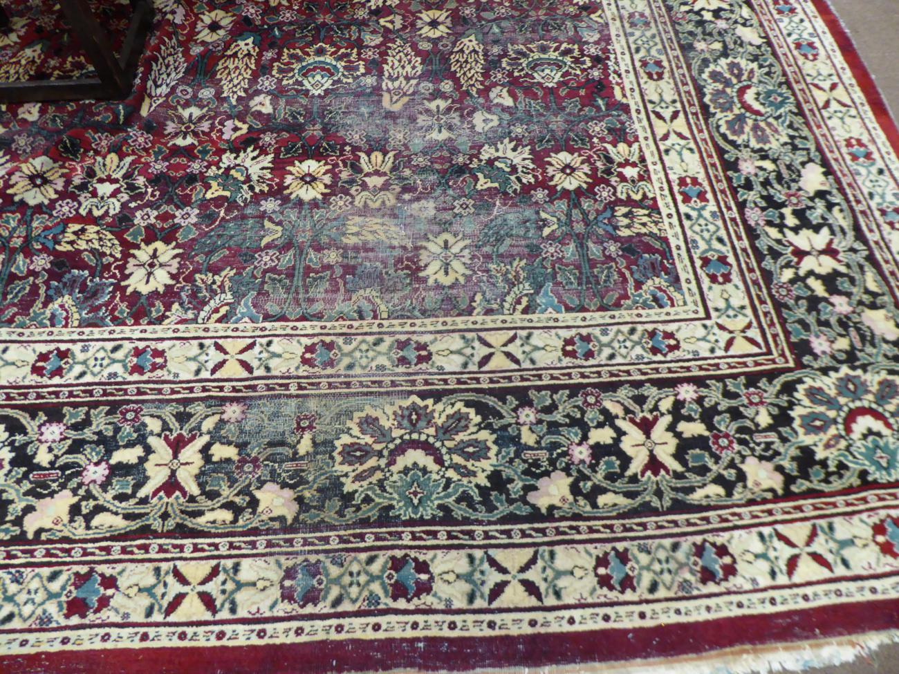 Agra Carpet Central/North India, late 19th century The abrashed raspberry field with an allover - Image 3 of 7