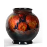 William Moorcroft (British, 1872-1945): A Flambé Leaf and Berry Pattern Vase, impressed MADE IN