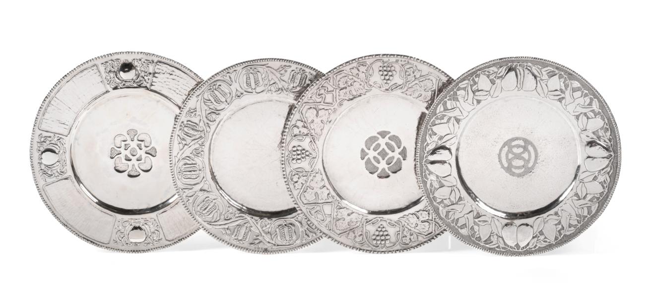 A Set of Four Edwardian Arts & Crafts Silver Plates, Thomas Adolphus Falcon, Birmingham 1902, each