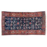 Good Bakhtiari Rug West Iran, circa 1930 The deep indigo lattice field of flowering plants