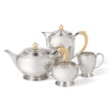 An Art Deco Four Piece Britannia Standard Silver Tea Service, Goldsmiths & Silversmiths Co Ltd,