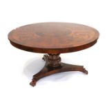 A Victorian Mahogany and Floral Marquetry Inlaid Circular Dining Table, circa 1860, the