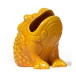 A Burmantofts Faience Pottery Toad Spoon Warmer, modelled seated with open mouth, mustard glaze,