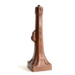 Mouseman: A Robert Thompson English Oak Table Lamp, octagonal column on a square base, with carved