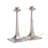 A Pair of Arts & Crafts Silver Candlesticks, James Dixon & Son, Sheffield 1919, the design
