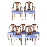 A Set of Ten Mahogany Hepplewhite Style Dining Chairs, early 20th century, including two carvers,