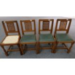 Mouseman: Four Robert Thompson English Oak Lattice Back Dining Chairs, with green cow hide upholste