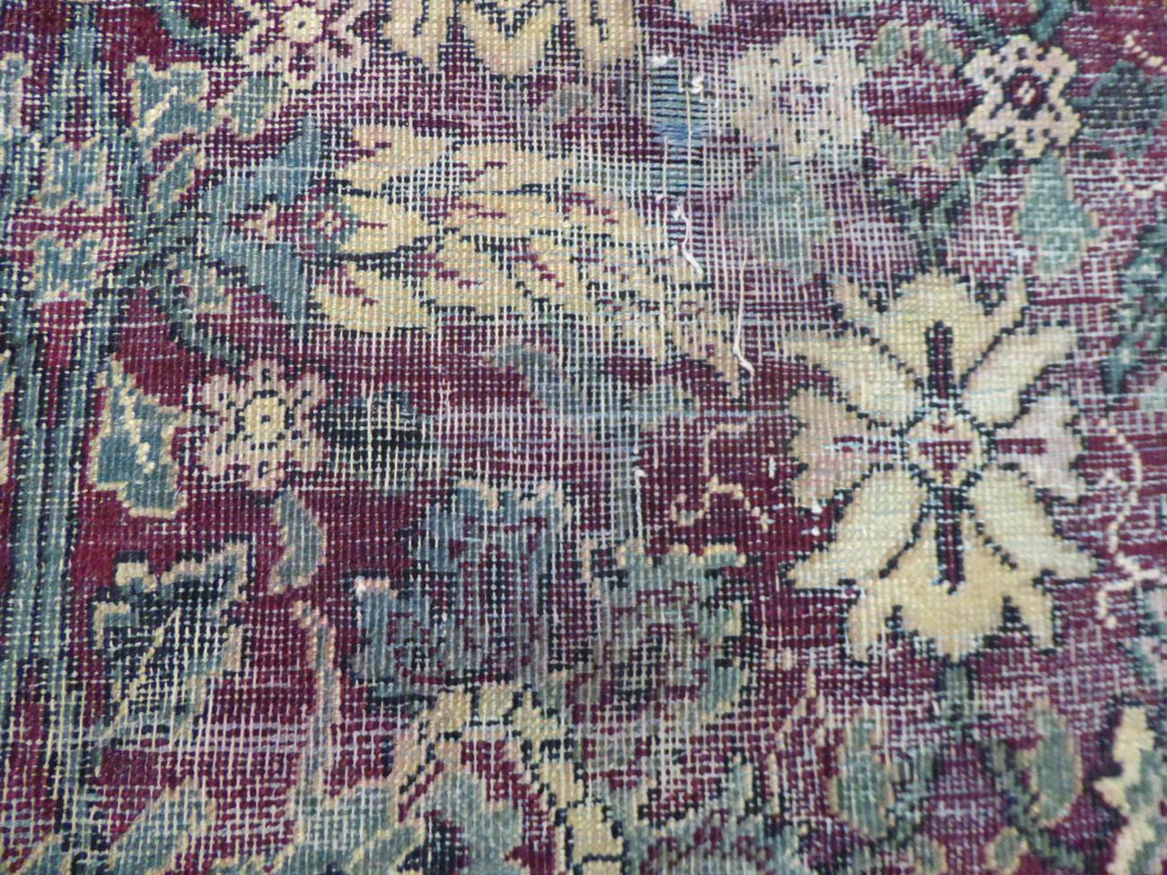 Agra Carpet Central/North India, late 19th century The abrashed raspberry field with an allover - Image 2 of 7