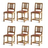 Mouseman: A Set of Six Robert Thompson English Oak Lattice Back Dining Chairs, with Mulberry cow