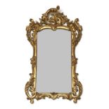 A Louis XV Style Carved Giltwood Mirror, 19th century, the bevelled glass plate within an acanthus