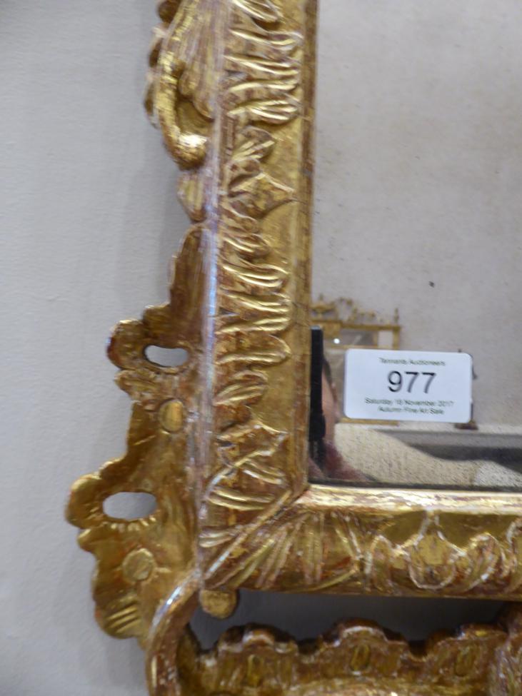 A George II Carved Giltwood Looking Glass, circa 1730, the mercury plate within a rockwork frame - Image 3 of 4