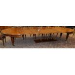 An Impressed Victorian Mahogany Extending Dining Table, circa 1870, of rounded rectangular form with