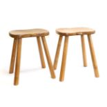 Mouseman: Two Robert Thompson English Oak Cow Stools, on four octagonal legs, each with carved mouse