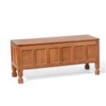 Mouseman: A Robert Thompson Panelled English Oak Blanket Chest, rectangular adzed hinged top, on