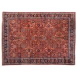 Good Mahal Carpet West Iran, circa 1920 The brick red field with an allover lattice design of