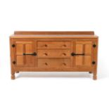 Mouseman: A Robert Thompson Panelled English Oak 5ft Sideboard, with raised upstand, above three