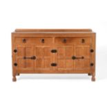 Mouseman: A Robert Thompson Panelled English Oak 5ft Sideboard, with raised upstand, above two