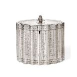 A George III Silver Tea Caddy, Robert Hennell, London 1786, of wavy oval outline with bright