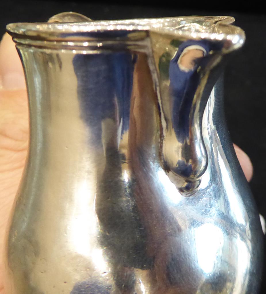 A George II Provincial Silver Cream Jug, Richard Richardson, Chester 1729, plain baluster form on - Image 4 of 6