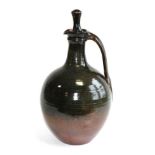 Joe (Joseph) Finch (British, b.1947): A Stoneware Bottle and Stopper, tenmoku glaze, impressed JF
