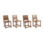 Mouseman: A Set of Four 1940s Robert Thompson English Oak Dining Chairs, panel-backs and adzed