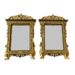 A Pair of 19th Century Italian Gilt and Gesso Wall Glasses, the rectangular bevelled plates within