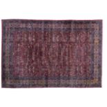 Indian Carpet, circa 1910 The raspberry field with an allover one way design of serrated scrolling