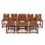 Mouseman: A Set of Eight (7+1) 1930s Robert Thompson Panel Back Dining Chairs, with aperture to