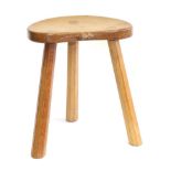 Mouseman: A Robert Thompson English Oak Calf Stool, on three octagonal legs, with carved mouse