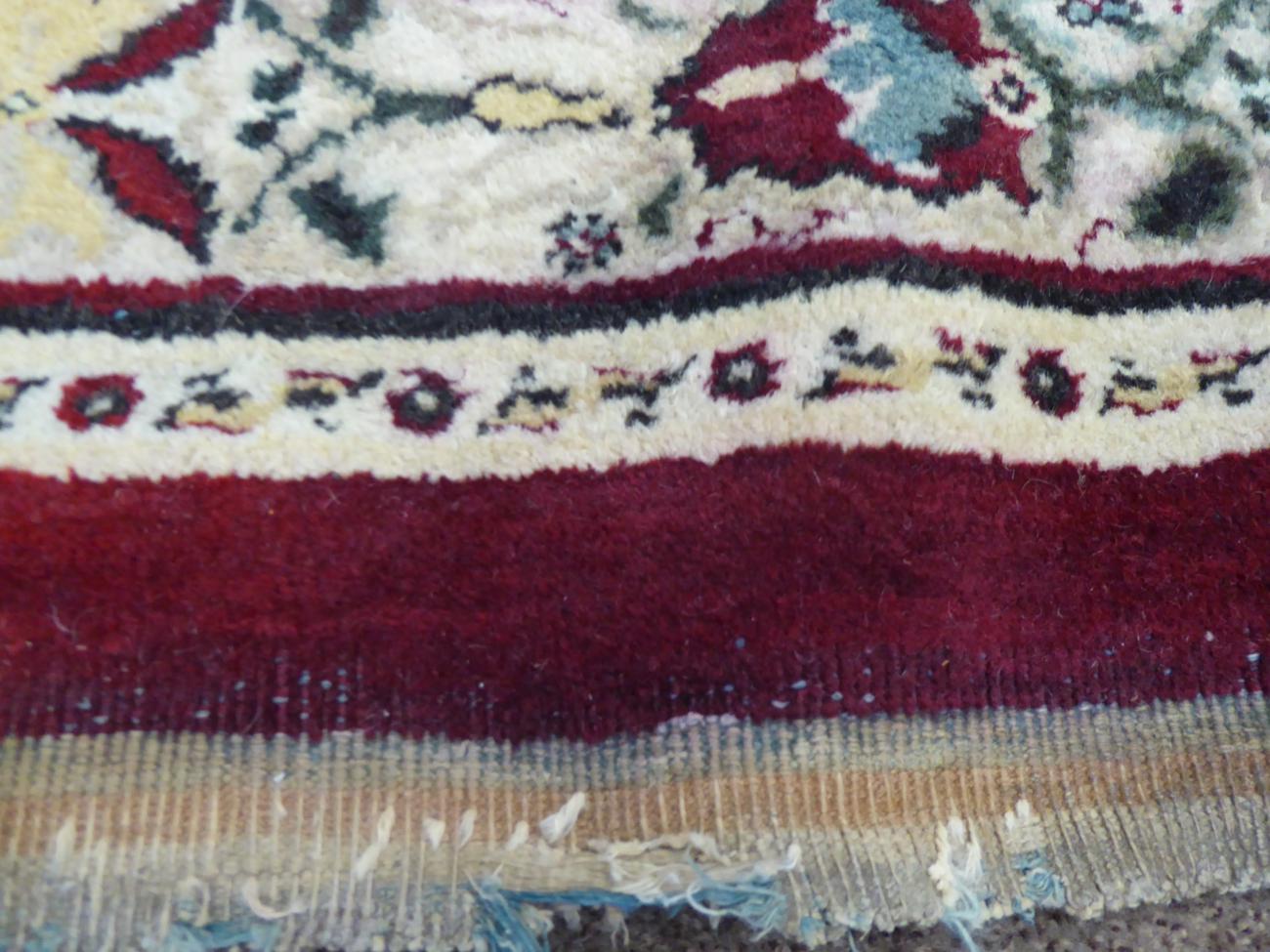 Agra Carpet Central/North India, late 19th century The abrashed raspberry field with an allover - Image 6 of 7