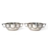 A Pair George V Silver Twin Handled Silver Bowls, maker's mark HL, London 1913, modelled in the form