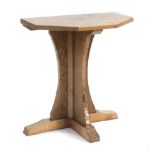 Mouseman: A Robert Thompson English Oak Hall Table, the adzed five-sided top, on three adzed