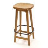 Mouseman: A Robert Thompson English Oak Bar Stool, shaped adzed top, on four octagonal legs, with