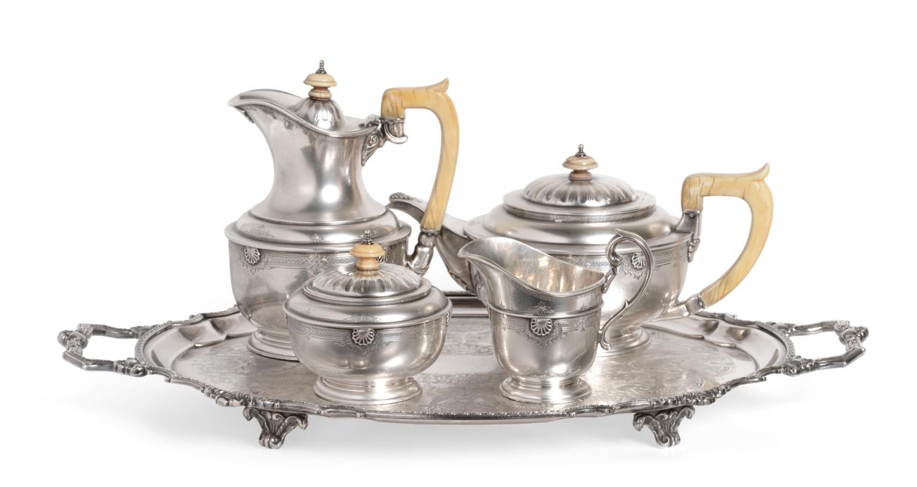 A George V Silver Four Piece Tea Service, James R Ogden, London 1931, of circular form, the shoulder