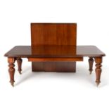 A Victorian Mahogany Wind-Out Dining Table, circa 1850, with four original leaves with moulded