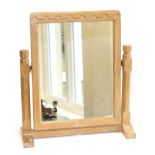 Mouseman: A Robert Thompson English Oak Stand Mirror, the rectangular mirror pivots between two