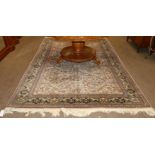 Hereke Carpet North West Anatolia, circa 1970 The pale mushroom field with an allover design of