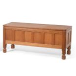 Mouseman: A Robert Thompson Panelled English Oak Blanket Chest, rectangular adzed hinged top, on