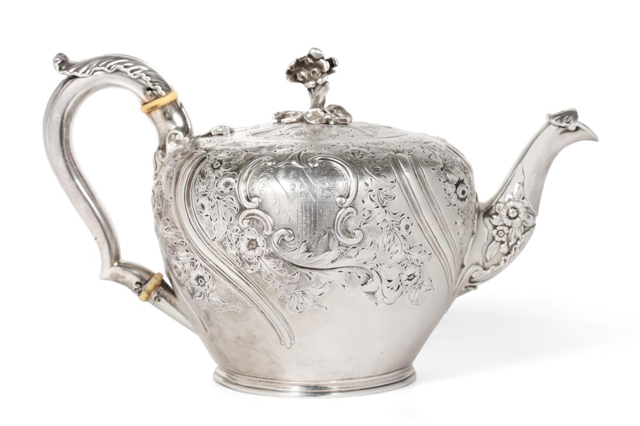 A George IV Silver Teapot, Paul Storr, London 1829, of inverted baluster shape, with foliate