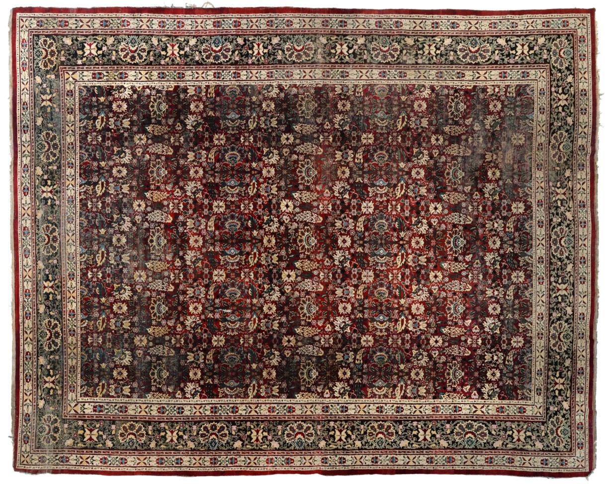 Agra Carpet Central/North India, late 19th century The abrashed raspberry field with an allover