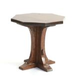 Mouseman: A 1930s/40s Robert Thompson English Oak Octagonal Coffee Table, on a cruciform base, adzed