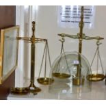 Two brass balance scales; a glass dome and an embroidered pole screen (4)