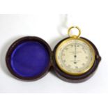 A Negretti & Zambra compensated pocket barometer, in leather case