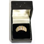 18 carat gold broad diamond band ring, pavé set with five bands of round brilliant cut diamonds,