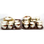 A Royal Albert twelve place Old Country Roses tea service (on two trays)