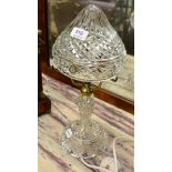 A cut glass mushroom lamp