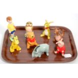 A set of seven Beswick Walt Disney Winnie the Pooh figures, together with a Wade Eeyore figure