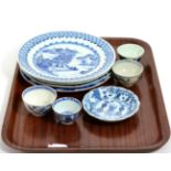 Four 18th century Chinese blue and white plates, four tea bowls and a saucer