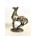 A cast silver model of a horse ''Playing Up'' by Lorna McKean, for The British Horse Society,