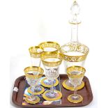 A Saint Louis Thistle pattern decanter, two red wine goblets; two white wine goblets and a champagne